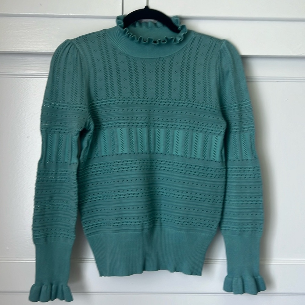 Light sweater size medium